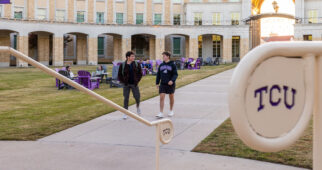 Students walk about the Worth Hills housing complex, December 2, 2024. Photo by James Anger.