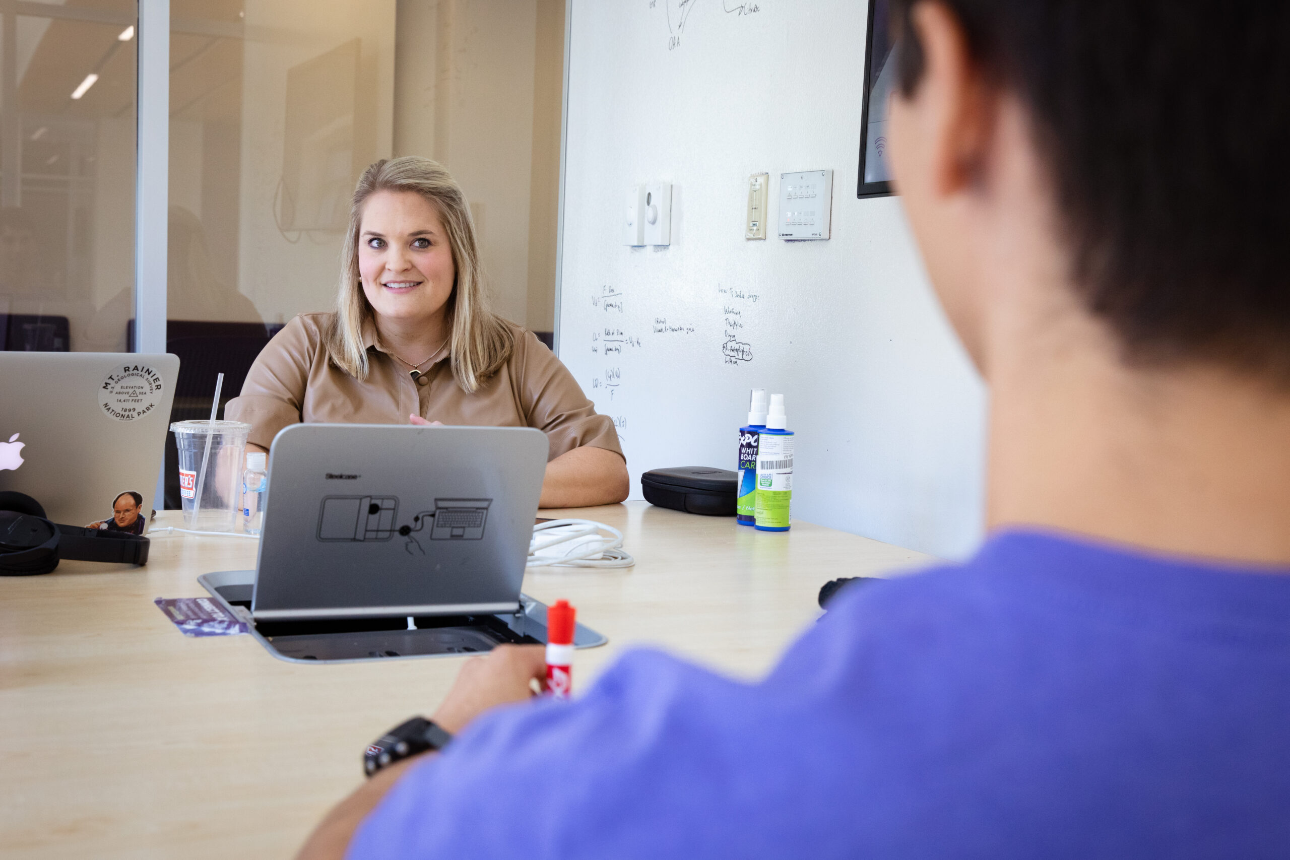 Annie Cowden (left) is the director for the BNSF Neeley Leadership Program. She is also a Ph.D. candidate and president of the Graduate Student Senate. Photo by Amy Peterson, August 10, 2023